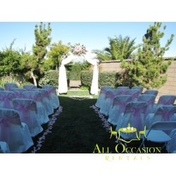 Iron white arch with draping  and  flower
