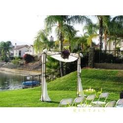 Iron square arch with draping and flower